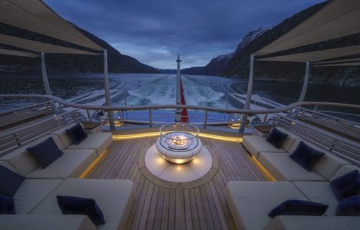 Seating area on charter yacht Flying Fox at night