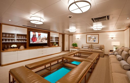 Glass floor in media room on board superyacht Suri