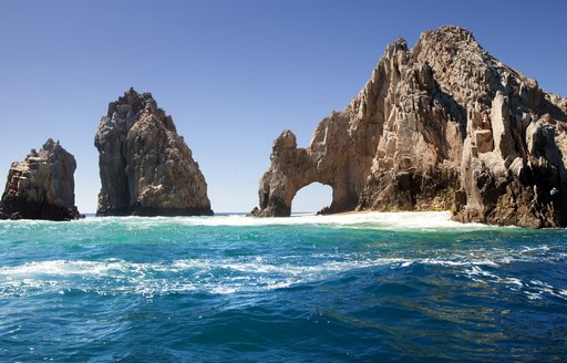 Striking rocks and small sandy islet in Sea of Cortez, Mexico