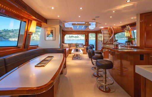 The bar and social area inside superyacht ASTRAPE