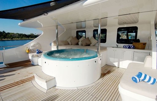 luxury charter yacht tango shaded deck Jacuzzi and sunpads