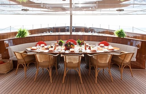 Shaded al fresco dining on board SHEMARA