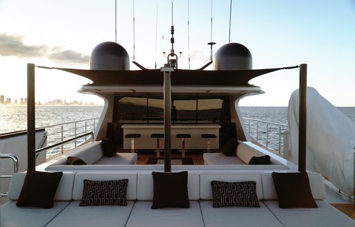 bar, sofa and sunning station on the flybridge of motor yacht SAHANA