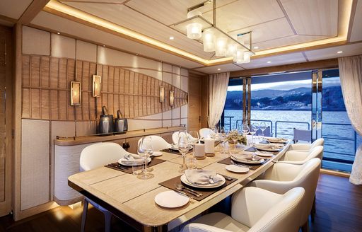 dining area and social space onboard luxury superyacht charter