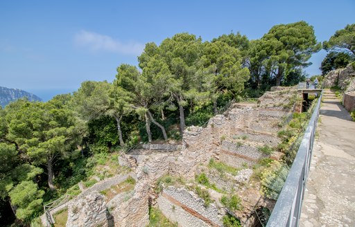 Walls and trees on the border of Villa Jovis in Capri