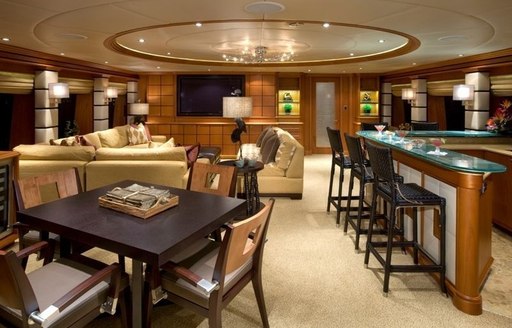 Main Salon with bar on superyacht EROS 