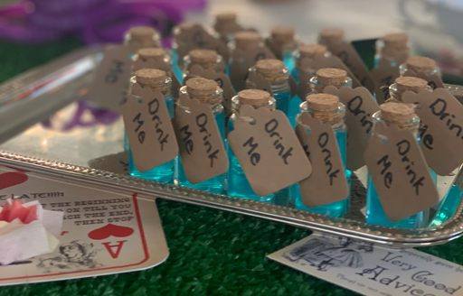 Alice in Wonderland-themed drinks prepared by the stewardesses on board a charter yacht 