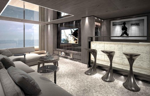 bar and sofa flanked by full-length windows on board superyacht SOLO