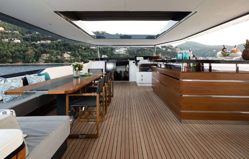 seating area, bar and skylight on superyacht moanna ii 