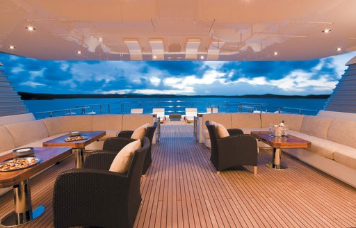 large seating areas under the radar arch on the sundeck of luxury yacht Odessa