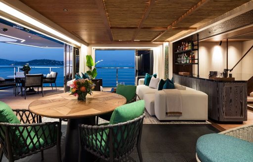 Interior seating area onboard charter yacht KING BENJI