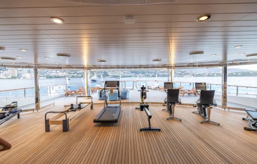 Spacious gym with equipment onboard charter yacht CARINTHIA VII