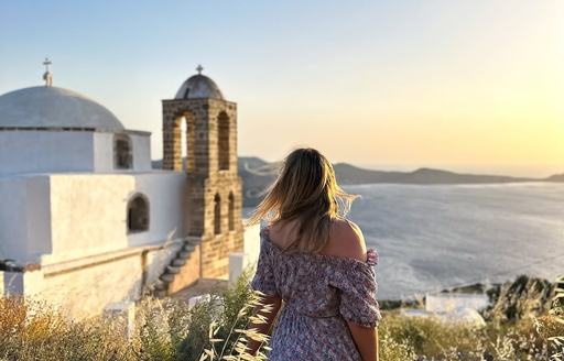 Woman facing Plaka Castle