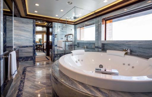 Ensuite facility onboard charter yacht AXIOMA with large tub