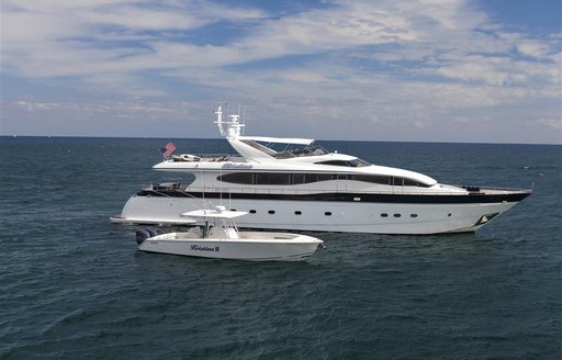 Charter yacht TROCA ONE at anchor with tender