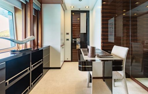 Charter yacht HOLDIN' MY OWN private owner's study with desk and chair