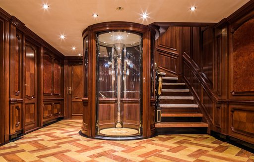 Circular elevator onboard superyacht charter TITANIA