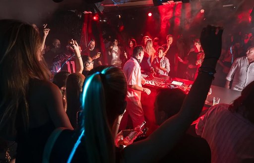 DJ set in action with lots of dancers