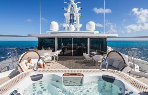 The Jacuzzi and sun lounging options available on the exterior of superyacht Grace E