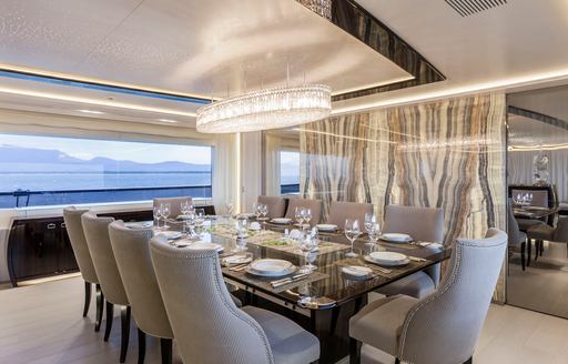 formal dining area in main salon of charter yacht ‘Polaris I’ 