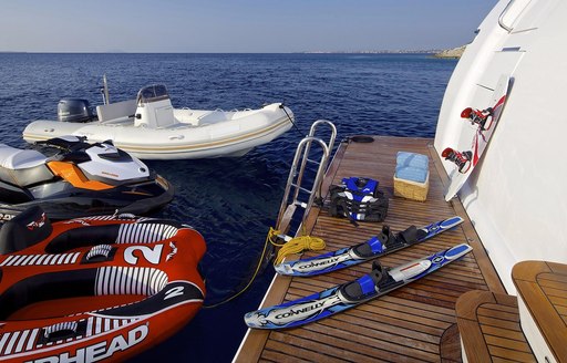 toys and accessories laid out for vacation fun on board charter yacht idylle