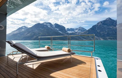 Two sunloungers sat on a retractable balcony integrated into superyacht CLOUDBREAK