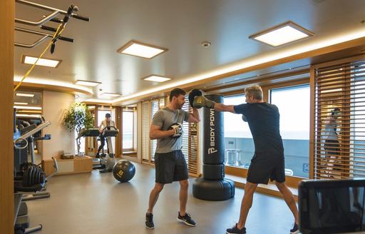 Gym on charter guests training onboard charter yacht FLYING FOX