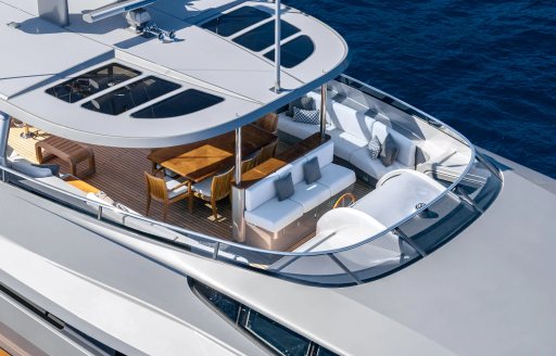 Super yacht charter AURA aerial profile of aft decks