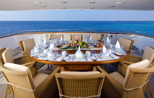 alfresco dining on the aft deck of superyacht idylle