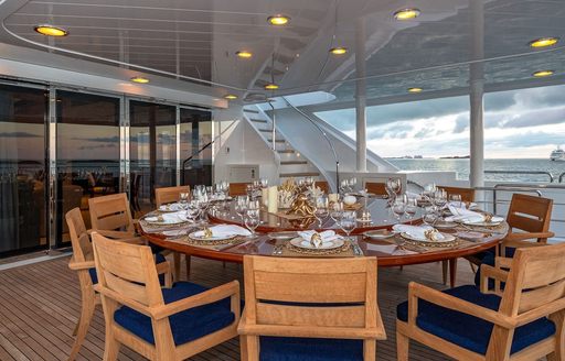 Super yacht charter PISCES exterior dining table