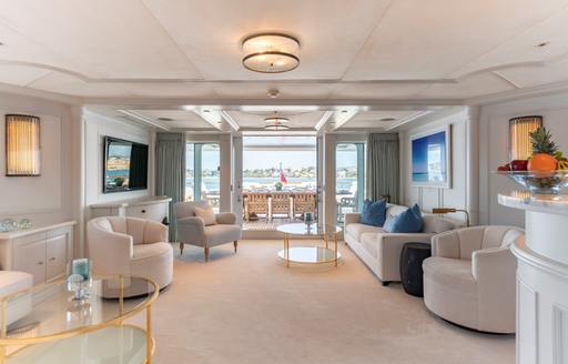 Upper salon lounge area onboard charter yacht MOSAIQUE