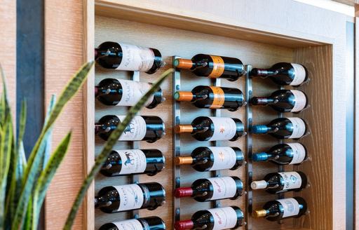 Charter yacht NORMA JEAN wine display on wall
