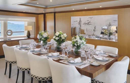 Interior dining area onboard charter yacht LA BLANCA
