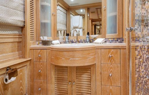 En-suite facility for a guest cabin onboard charter yacht QUEST R with large sink unit