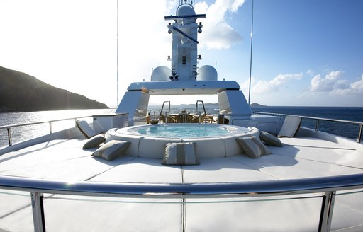 Jacuzzi with sun pads on luxury charter yacht HARLE