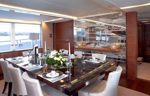 Charter yacht IMPERIAL PRINCESS BEATRICE interior dining area with long table
