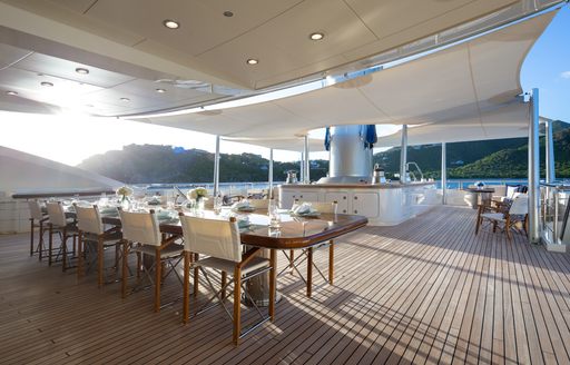 Exterior dining setup onboard charter yacht BLACK PEARL