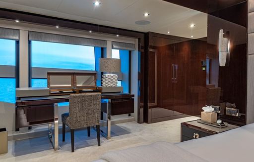 Master cabin bureau with large window onboard charter yacht TC 