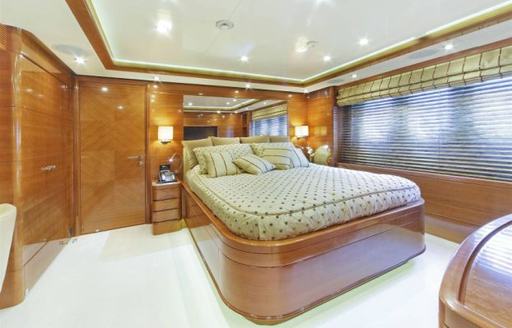 Charter yacht EVERBLUE guest cabin and central berth