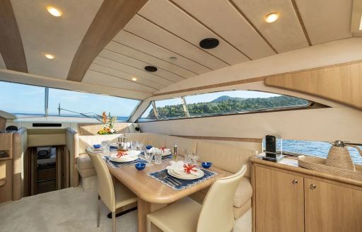 Charter yacht IRENE interior dining area