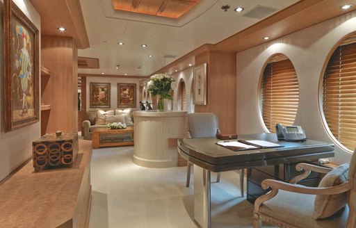 study and seating area on board luxury yacht Deja Too