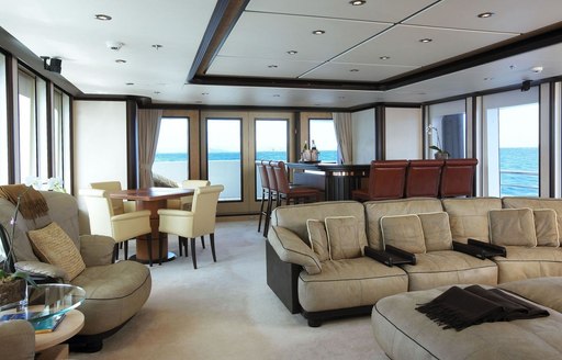 lounge and bar in main salon of superyacht HARLE 