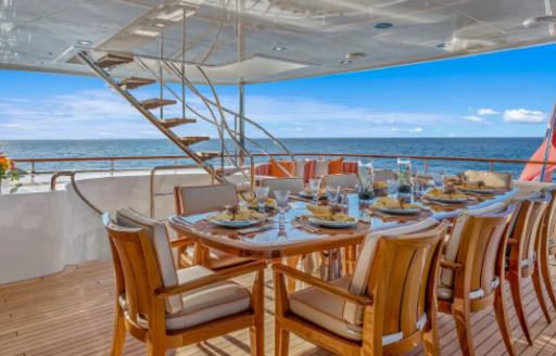 Charter yacht AVALON exterior dining set up