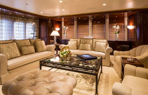 classically styled main salon on board superyacht ‘Blue Moon’