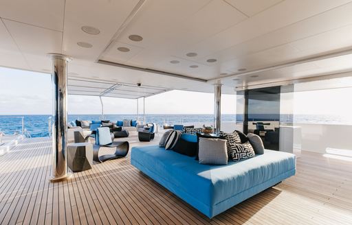 Exterior seating area onboard charter yacht ETERNITY