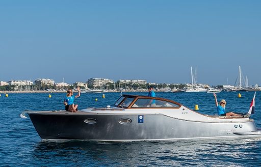 Concours d’Elegance parade with two female crew members