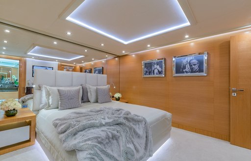 Guest cabin with central double berth onboard charter yacht DB9