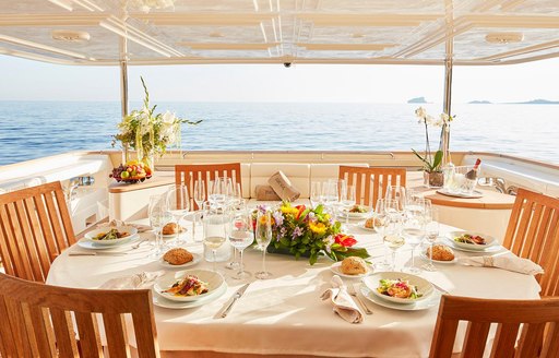 alfresco dining area set up for dinner on board superyacht DEVA