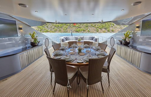 The alfresco dining table on board superyacht 'Grey Matters'