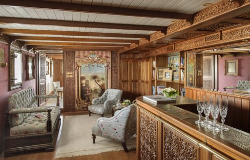 luxurious salon with bar on classic yacht 'La Sultana'